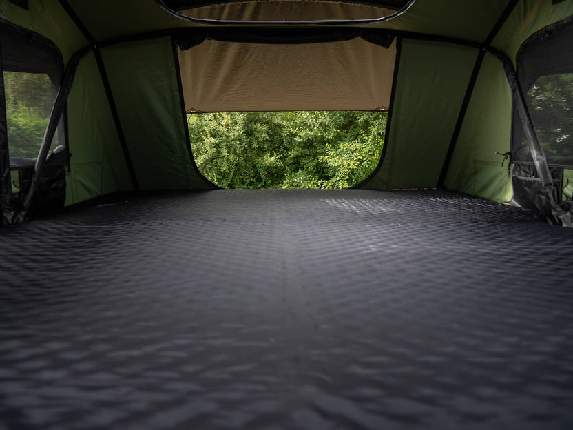 TentBox Lite XL rooftop tent interior with fully laid out mattress topper – spacious and ready for sleep