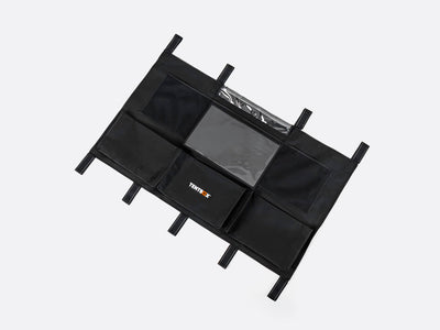 Black multi-compartment Lite Storage Pockets on a white background. - Accessories