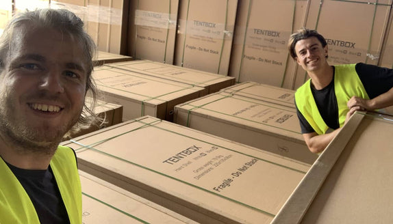 TentBox founder Oliver and first employee Dom in the first warehouse